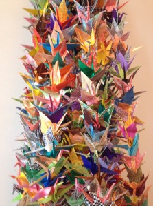 Paper origami cranes in a local church created to honor the many lives lost in mass shootings.